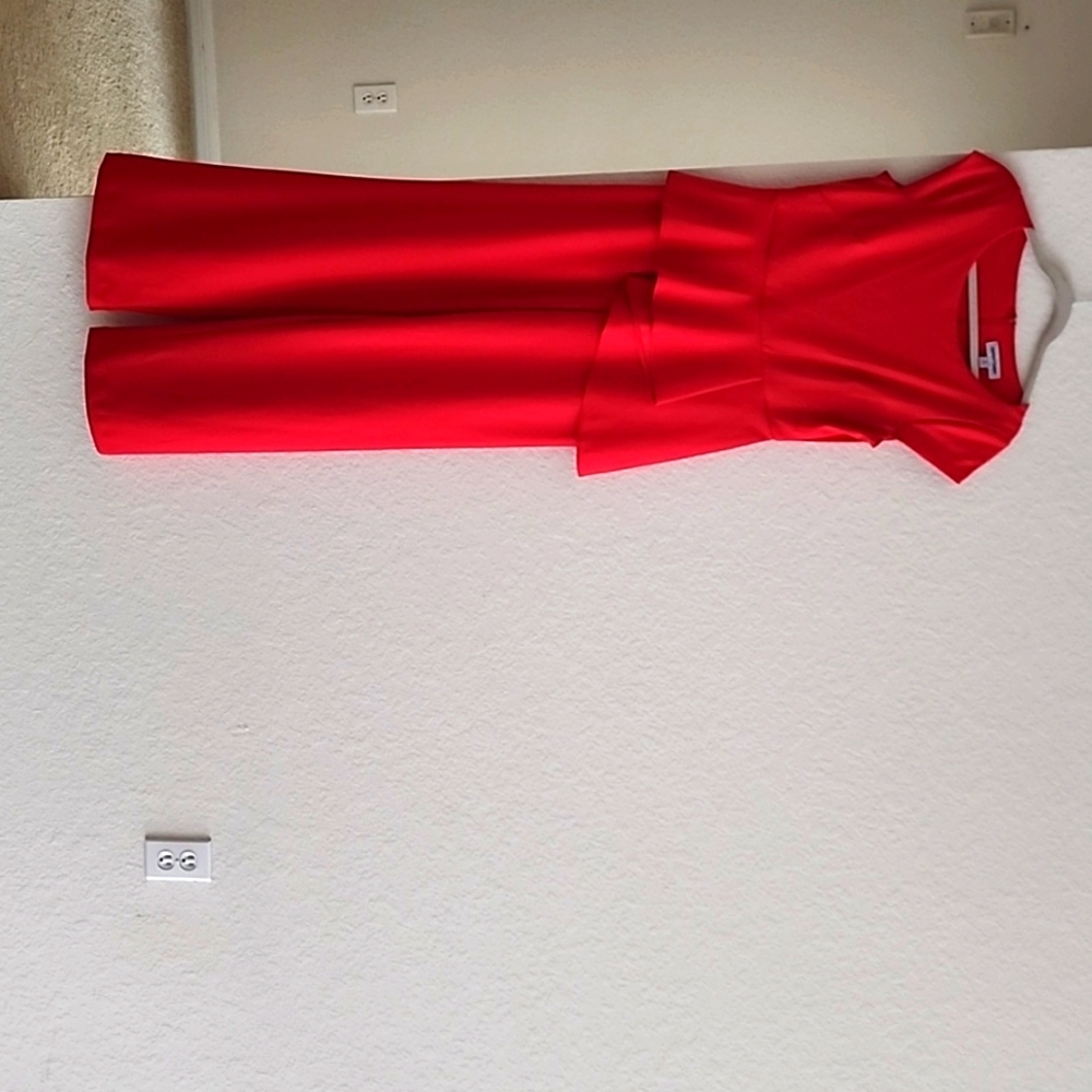 I'm selling a woman's red jumpsuit inside eight.